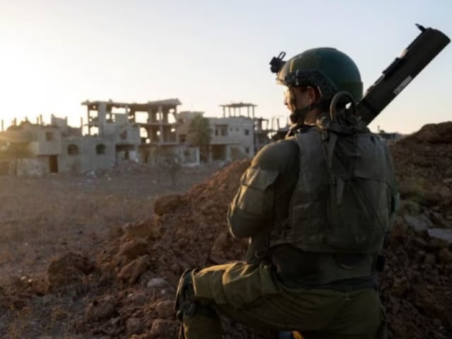 an israeli soldier takes position during the ongoing ground operation of the israeli army against palestinian islamist group hamas at a location given as gaza in this picture released on november 17 2023 israeli defence forces handout photo reuters